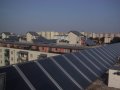 Solární systém k ohřevu TUV a přitápění na střeše obytných domů ve Vídni